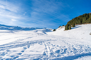 Winter landscape with snow Swiss Alps from Mannlichen mountain in Grindelwald ski resort. Winter in Switzerland