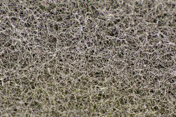 Sponge texture background. cleaning sponge material detail close up view. Dish washing or beauty care. Macro