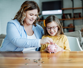 piggy bank mother daughter money savings coin finance