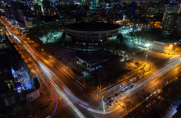 Fototapeta na wymiar Beijing highway street by modern Chinese buildings 
