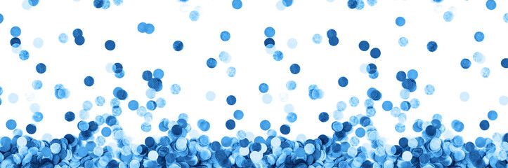 Banner made from blue confetti isolated on a white background. Festive concept. Children's party,...