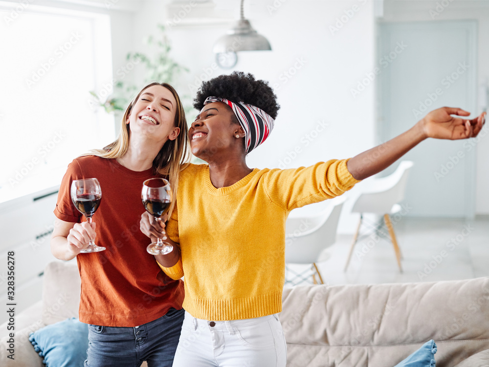 Wall mural girl party dancing drinking wine happy fun friend care free