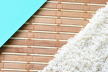 Natural raw white rice grains, on display in bowl