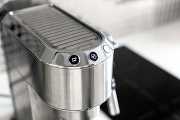 Fototapeta na wymiar Close-up of making coffee in a coffee machine.