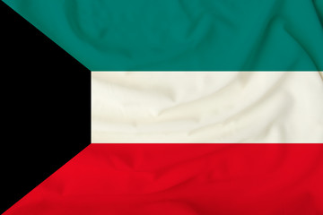 beautiful photograph of the national flag of Kuwait on delicate shiny silk with soft draperies, the...