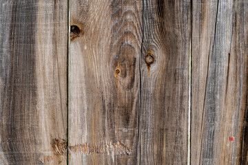 Texture od wooden planks. Wall made of antique wood. Raw wood after century.