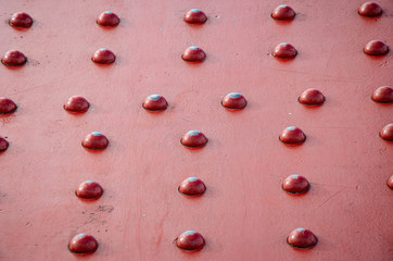 red industrial rivets