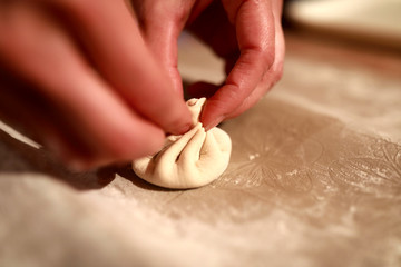 Chef cooking khinkali