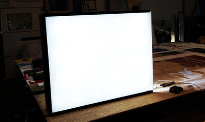 white screen on the table with a bright light