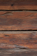 Fototapeta premium Texture od wooden planks. Wall made of antique wood. Raw wood after century.