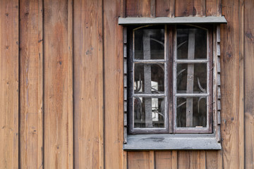 Old wooden window fitted in the old church.