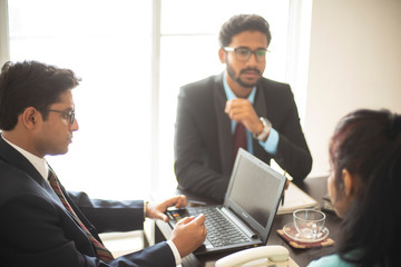 Corporate interview of a young and energetic female applicant in Indian office taken by Indian male interviewer.  Indian corporate.