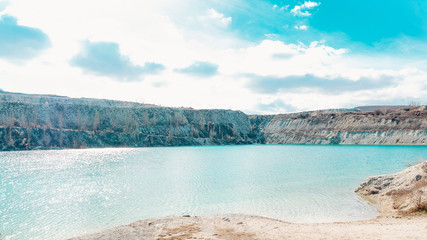 Obraz premium Marble Lake, founded among limestone rocks. Flooded quarry.