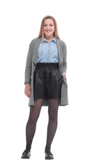 in full growth. stylish young woman in a coat.