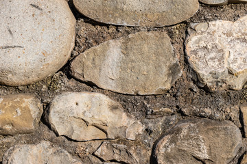 A close-up shot of a traditional medieval stone wall