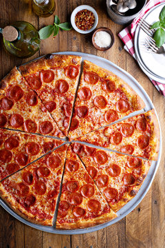 Fototapeta Large pepperoni pizza