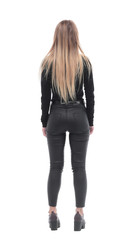 rear view. young woman in casual clothes looking forward.