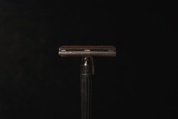 Old black shaving machine close up