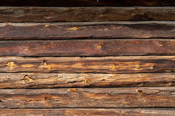 Fototapeta premium Texture od wooden planks. Wall made of antique wood. Raw wood after century.