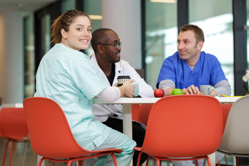 doctors team talking expertise in hospital