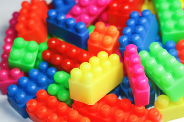 close up plastic toy blocks isolated