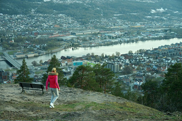 Bench overlooking Drammen city view.