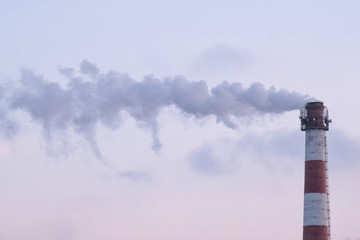 smokestack of a boiler room polluting the environment