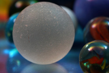 Naklejka na ściany i meble Colorful glass balls photographed in studio with macro