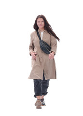 in full growth. pretty young woman walking to a meeting