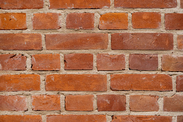 Texture of old red brick wall.