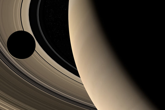 Moon orbiting around Saturn planet and her rings in the outer space. 3d render
