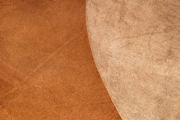 Brown leather.Natural leather texture. Brown-beige leather combination background.Smooth and matte...
