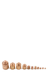 Set of precision weights for a balance scale isolated on white background by descending order