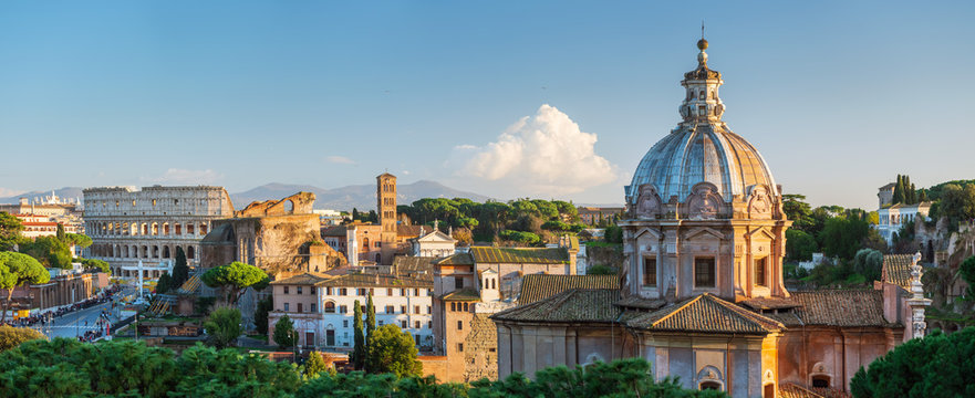 wide panorama to roman forum and colosseum in Rome