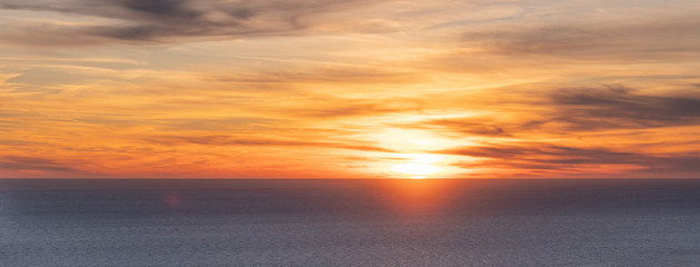 Colorful sunset at sea. Beautiful cloudscape