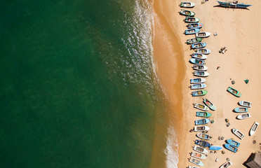 Vibrant boats on beach in Sri Lanka