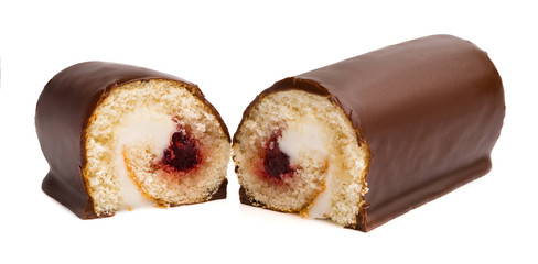 Chocolate cake roll with berry jam and butter cream cut in half isolated on white background