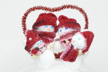 toy family of snowmen parents with children