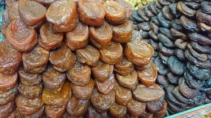 Assorted dried fruits in bags.