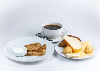 cup of coffee and cookies on plate