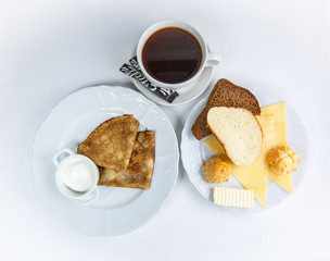 cup of coffee and cake isolated on white background