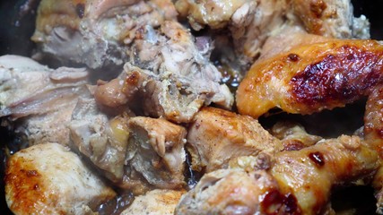 Fry juicy meat with a brownish crust. Close-up.