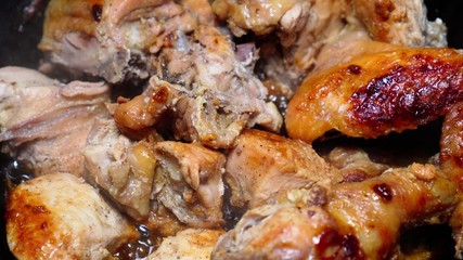 Fry juicy meat with a brownish crust. Close-up.