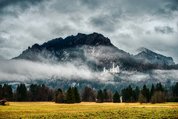 Neuschwanstein castle at in fog, Germany