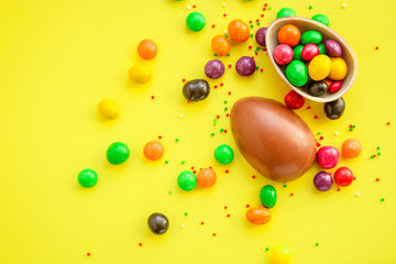 chocolate egg and candy Happy  easter decor. menu concept background. top view. copy space