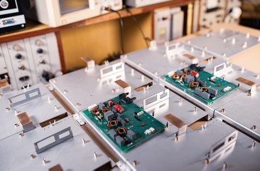 Fototapeta premium Microcircuits and components lie on metal plates
