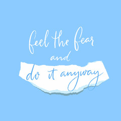 Naklejka na ściany i meble Feel the fear and do it anyway. Motivational quote, inspiring words. Modern calligraphy inscription on torn paper piece on blue background