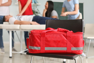 Bag of paramedic on chair at first aid training course