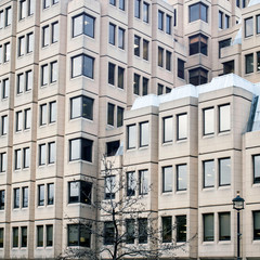 modern architecture. Structural glazing of skyscraper exterior. Office tower building fragment with windows.
