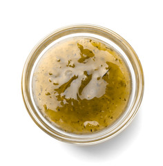 Bowl with tasty sauce on white background